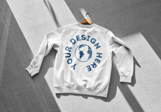 Mockup of customizable color long sleeve shirt against customizable background, rear view