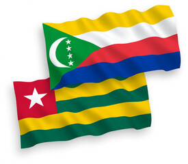 Flags of Togolese Republic and Union of the Comoros on a white background