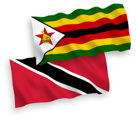 Flags of Republic of Trinidad and Tobago and Zimbabwe on a white background