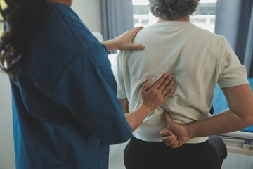 A Modern rehabilitation physiotherapy worker with senior client