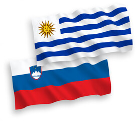 Flags of Slovenia and Oriental Republic of Uruguay on a white background
