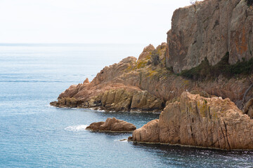 Naklejka premium Corners of the Costa Brava, paradise of relaxation, sea, rock, swimming and sun.