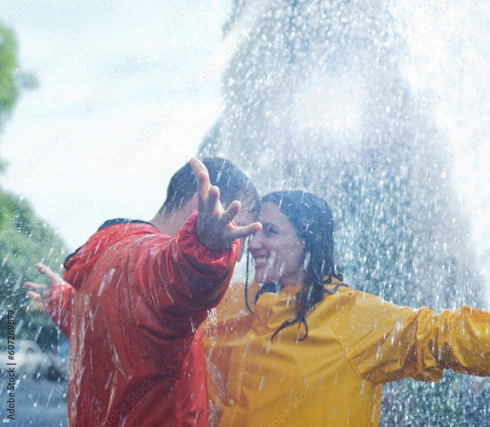 Wall mural happy couple dancing in rain