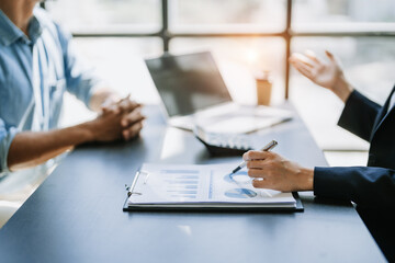 startup business, business advisor leadership for planning finance investment teamwork paperwork audit and discussing marketing, profit, budget of company in meeting room.