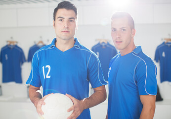 Obraz premium Soccer players standing in locker room