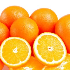 photo sliced and whole oranges