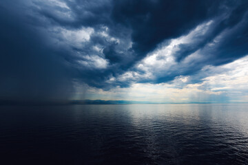 Fototapeta na wymiar Rainy clouds over town of Rijeka in Croatia at the Adriatic sea coast, weather and climate background