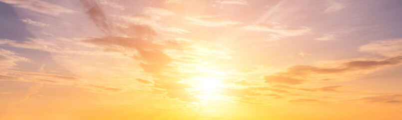 The rays of the sun breaking through the clouds in the evening or in the morning in the sunset or...