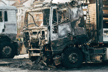 Fototapeta na wymiar Semi truck engulfed by fire flames after traffic accident is burned and damaged