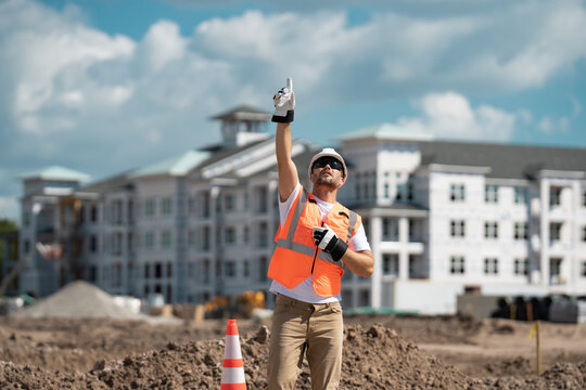 Hispanic 40s Worker Builder Man On Site Construction. American Middle Aged Man Worker. Millennial Construction Worker With At Building. Portrait Of Builder Worker Man Small Business Owner.