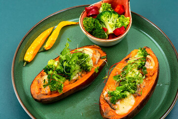 Baked sweet potato with vegetable filling.