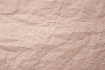 Abstract brown paper wrinkles or crumpled texture background , top view , flat lay.