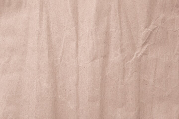 Abstract brown paper wrinkles or crumpled texture background , top view , flat lay.