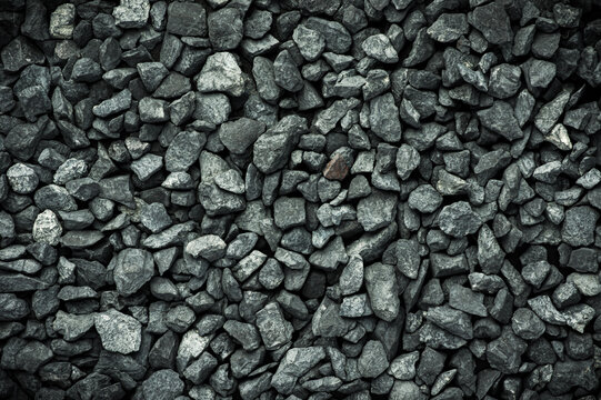 shungite macro detail texture background. close-up raw rough unpolished semi-precious gemstone