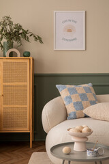 Cozy living room interior with mock up poster frame, boucle sofa, round coffee table, beige rug,...
