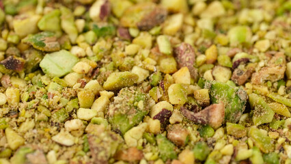 Ground pistachios close up.  Ingredients for bakery and dessert