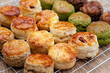 Five flavour of scone, chocolate, butter, cranberry, Earl grey, Matcha, served with clotted cream and raspberry jam. 