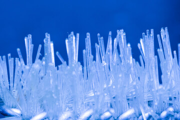 fiber optics concept shot against blue background