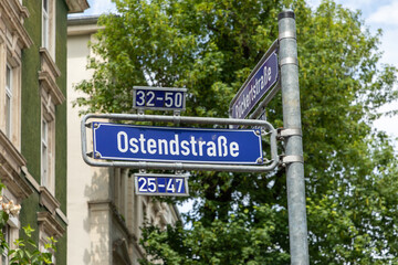 street sign ostendstrasse - engl_ east end street - un blue enamel in Frankfurt