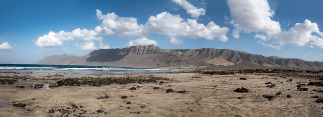 scenic volcanic beach landscape at Famara in Lanzarote, Canary islands