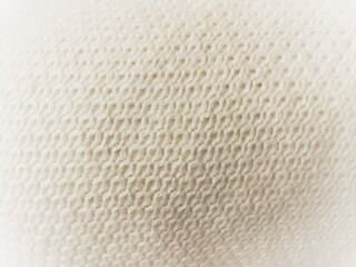 White knit fabric, blurred gradient, abstract, for background.