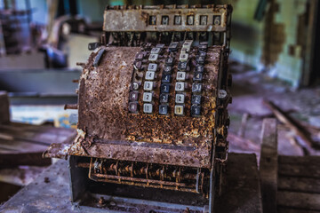 Old cash register in 2nd high school in Pripyat abandoned city, Chernobyl Exclusion Zone in Ukraine
