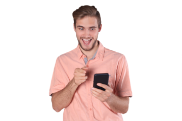 Shocked young man standing using mobile phone on a transparent background