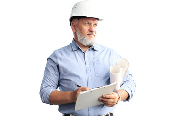 Confident mature business man in hardhat holding blueprint and looking away while standing on a...