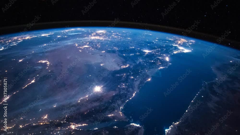 Wall mural planet earth at night seen from space in real time. view from international space station. public do