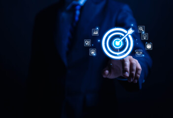 Businessman showing target virtual darts icon arrow. Goal concept for business investment. marketing strategy	
