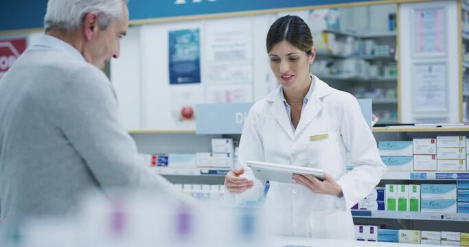 Woman, pharmacist and helping senior man with medicine info, healthcare services and product advice. Pharmacy, customer and medical support in retail store, pharmaceutical shop or drugstore for pills