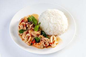 Fried Rice with Seafood and Basil isolated on white background