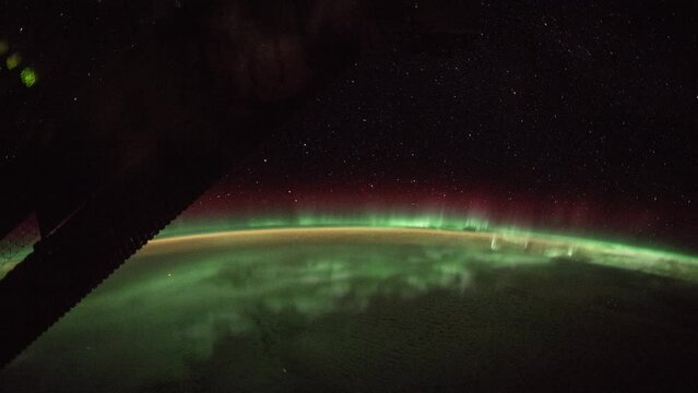 Aurora over planet Earth seen from space. View from International Space Station. Public Domain images from Nasa	
