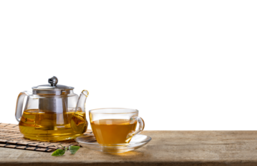 Tea cup with with steaming teapot on the wooden desk with transparent background png, Japanese style