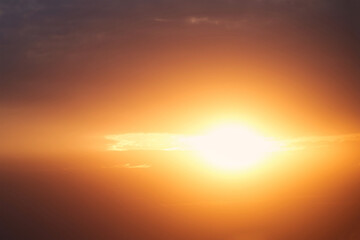 Sun shines through the clouds, overcast. The sun's rays break through the black clouds