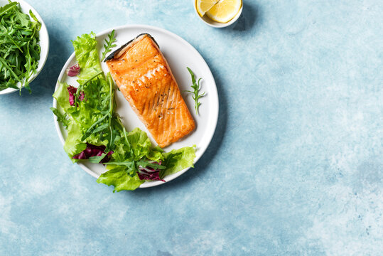 Salmon fish staek and leaf salad