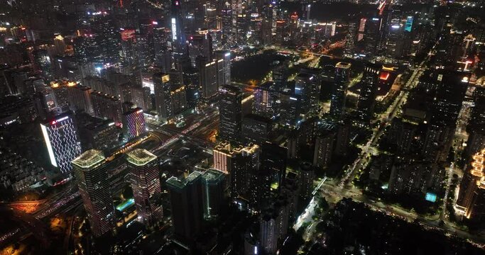 Aerial footage of night cityscape in downtown of shenzhen city, China
