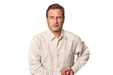A middle-aged man isolated having a liver pain, stomach ache.