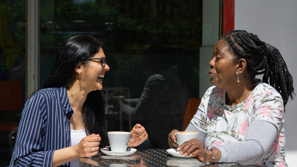 meeting of friends in a cafeteria on a sunny autumn afternoon