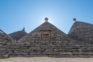 Fototapeta na wymiar Close up view of trulli conical roofs in Alberobello in Apulia in Italy