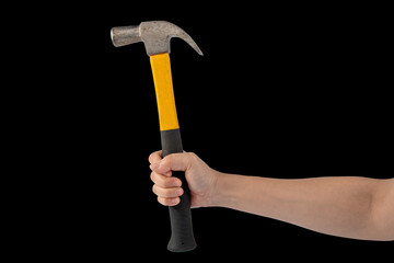 Hand with hammer on black background.