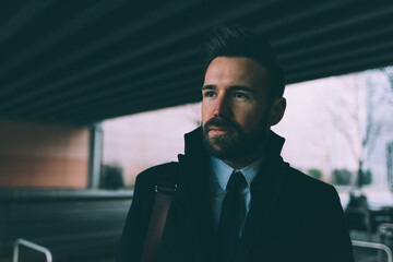 Young contemporary businessman overlooking