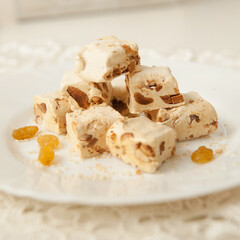 turkish dessert rahat lokum with nuts on a plate