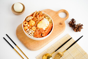 Seblak jeletot indonesia traditional food with any variant toping.