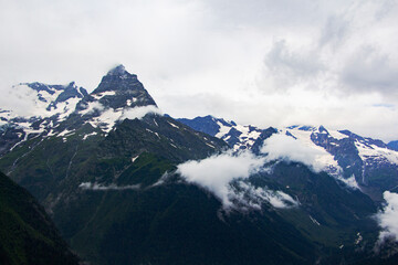 Naklejka na ściany i meble The Caucasus Mountains. Mountain peaks in summer.