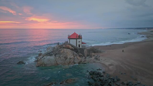 Aereal view of Lord of the Rock chapel at sunset (Capela do Senhor da Pedra)