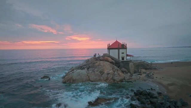 Aereal view of Lord of the Rock chapel at sunset (Capela do Senhor da Pedra)