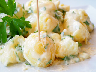 Close-up of potatoes with Aioli garlic sauce
