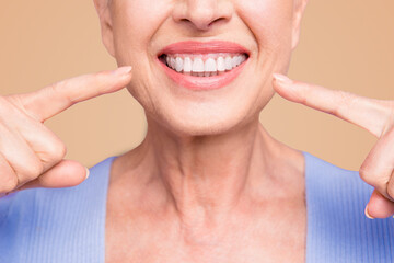 Concept of having strong healthy straight white perfect teeth at old age. Cropped portrait of...