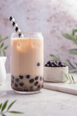 Milk bubble tea with tapioca pearls and honey